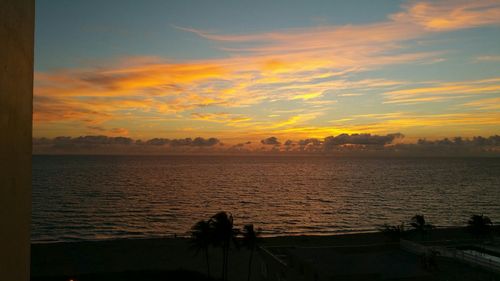 Scenic view of sea at sunset