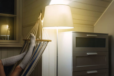 Low angle view of illuminated electric lamp