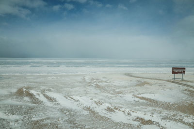 Scenic view of sea against sky during winter