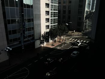 High angle view of street amidst buildings in city