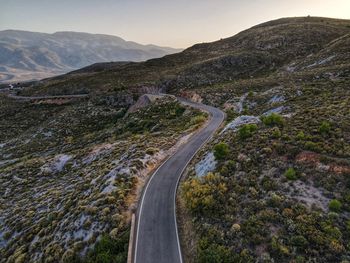 Scenic view of mountain road against sky