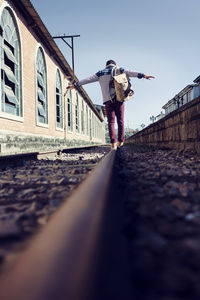 Man walking on walkway