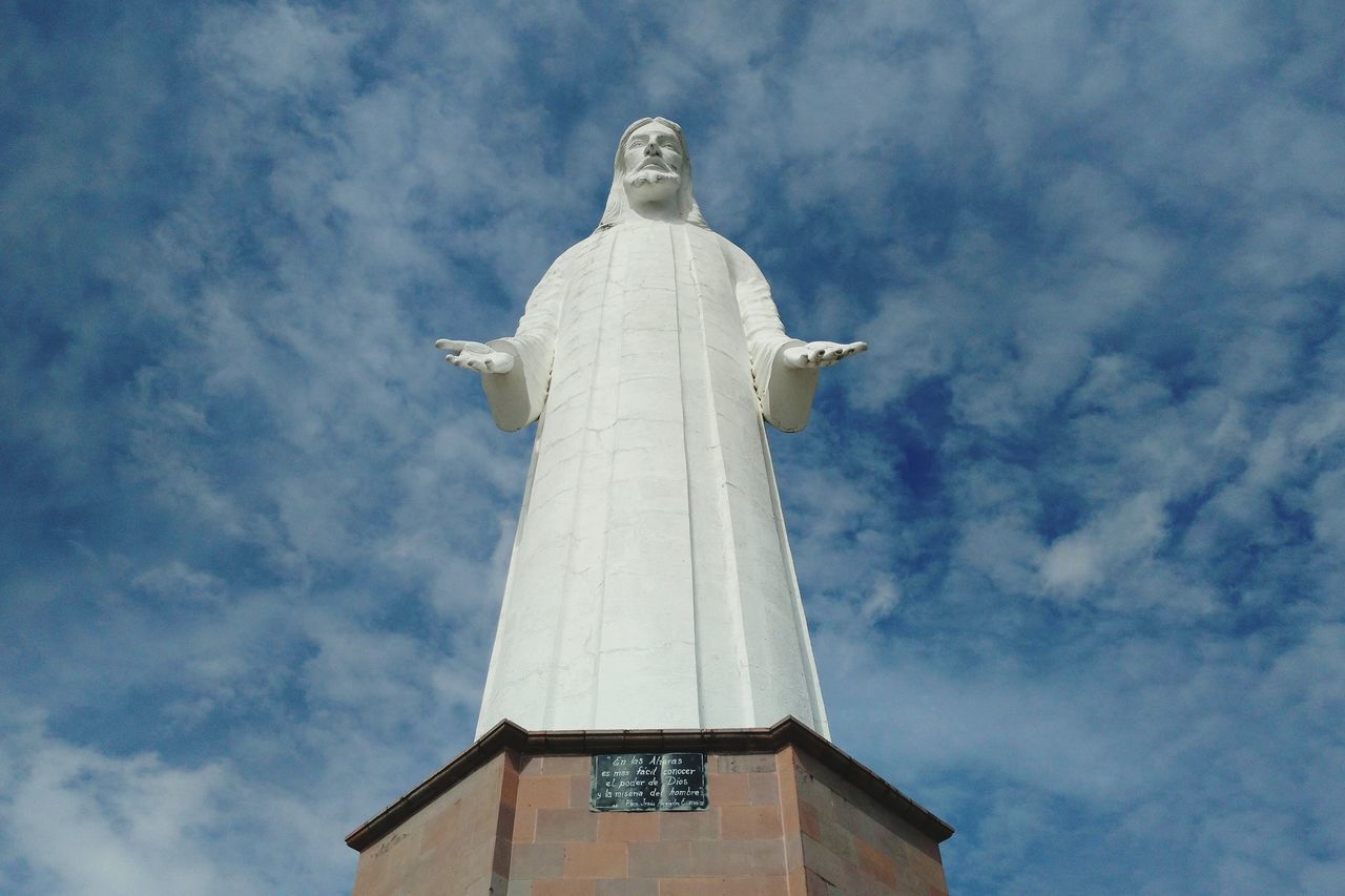 sky, human representation, statue, cloud - sky, low angle view, day, sculpture, architecture, no people, outdoors