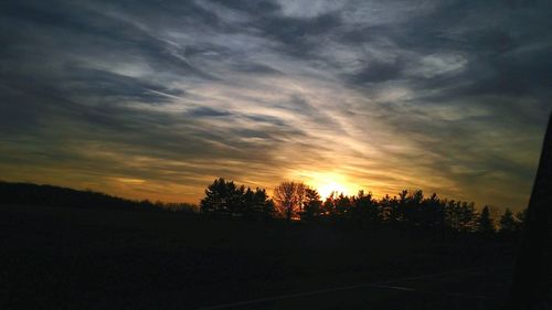 Scenic view of landscape at sunset