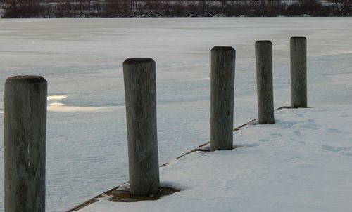 Wooden railing in winter