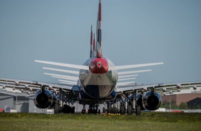 Rear view of multiple boeing aircraft in british airways livery 