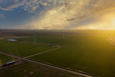 Scenic view of landscape against sky during sunset