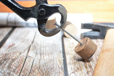 Close-up of chain on table