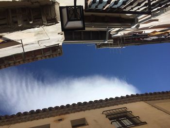 Low angle view of building against blue sky