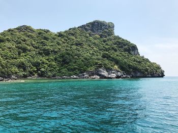 View of mountain on sea against sky