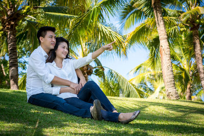 Young couple kissing in park