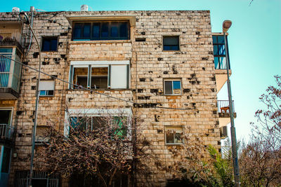 Low angle view of old building against sky