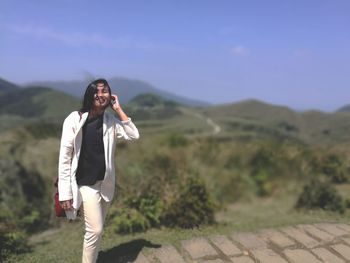 Woman standing on landscape