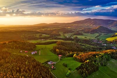 Aerial view of landscape against sky during sunset