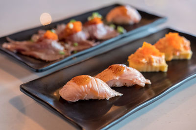 Close-up of sushi served on table