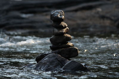 Close-up of stone stack on rock