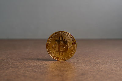 Close-up of coins on table