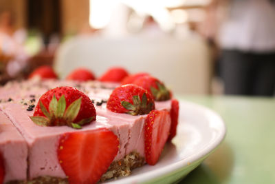 Close-up of fruits in plate on table