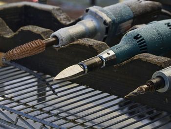 Close-up of machine against wall