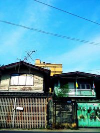 Low angle view of built structure against blue sky