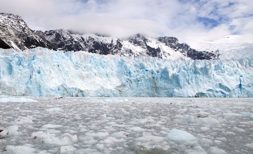 Scenic view of frozen lake against sky