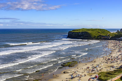 Beach on a beautiful sunny day in the summer of torres city on rio grande do sul state, brazil