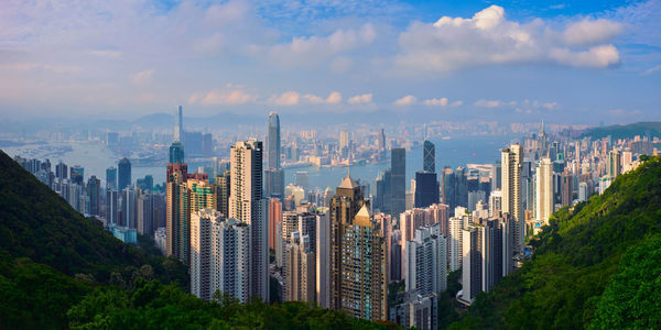 Buildings in city against sky