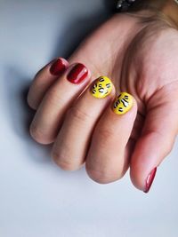 Close-up of woman hand showing nail art