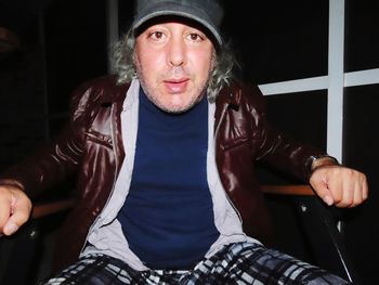 Portrait of man sitting at home