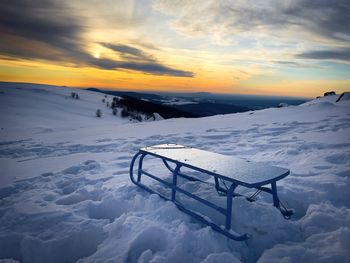 Sleigh at sunset