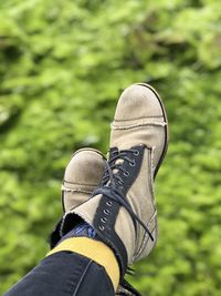Low section of person wearing shoes outdoors