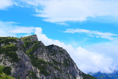 Low angle view of rock formation against sky