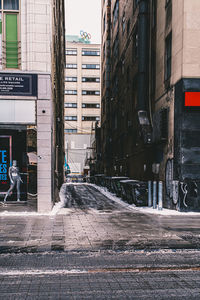 Street amidst buildings in city
