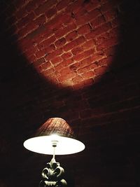 Low angle view of illuminated lamp