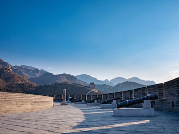 Scenic view of mountains against clear blue sky