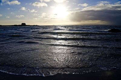 Scenic view of sea against sky during sunset