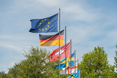 Mainau, germany, july 20, 2023 flag of the european union is waving with other european flags