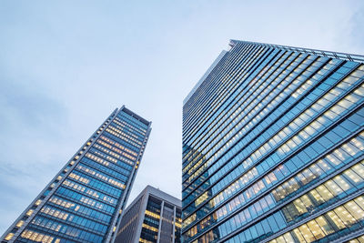 Low angle view of modern buildings against sky