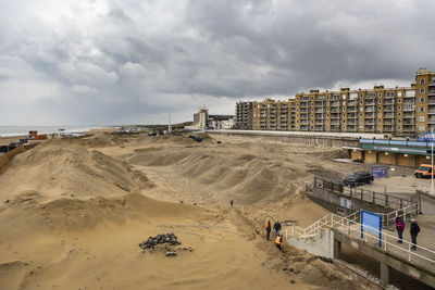 Panoramic view of beach against sky in city