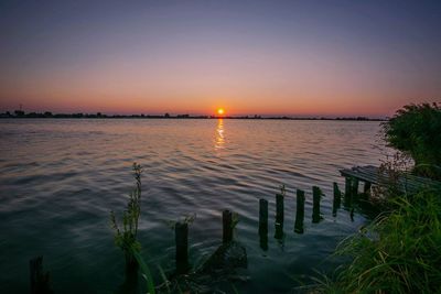 Scenic view of sea against sky during sunset