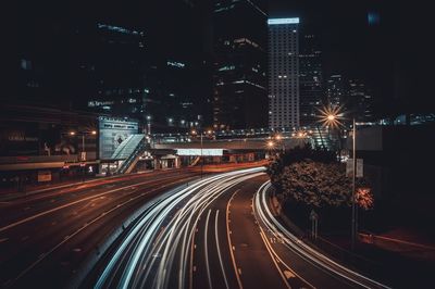 High angle view of light trails on road at night