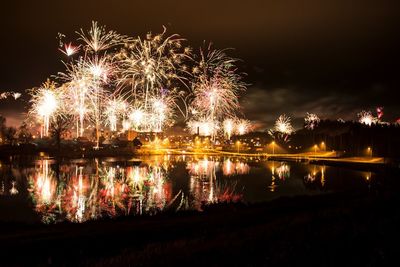 Firework display at night