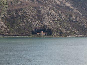 Scenic view of sea against mountain