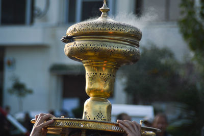 Close-up of hand on old city