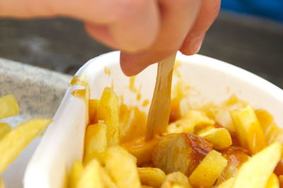 Close-up of hand holding food