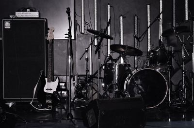 Black and white rock music instruments on stage