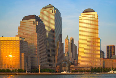 Skyscrapers in city against sky