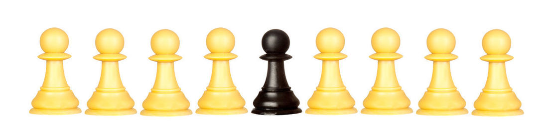 Close-up of chess board against white background