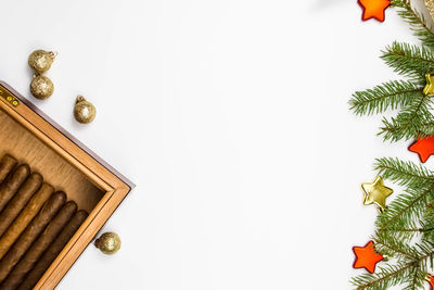 High angle view of decoration on table against white background