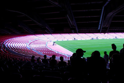 People standing in stadium